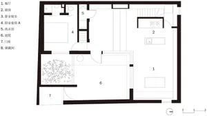 Black and white floor plan depicting a modern residential house layout.