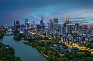 Modern cityscape featuring concrete, glass, and steel structures