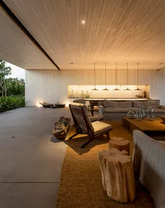 Minimalist living room with wooden furniture and pendant lights