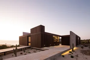 Modern minimalist house exterior made of wood and concrete