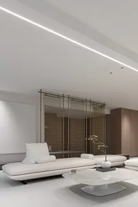 Modern minimalist living room featuring a concrete floor, white furniture, and a sleek, contemporary design.