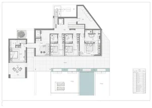 Floor plan of a modern residential building with concrete and glass materials.