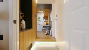 View of an industrial-style residential home interior with wood accents and a modern aesthetic.