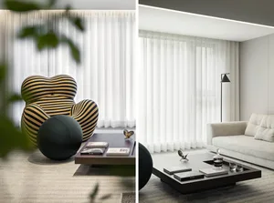 A modern living room featuring a patterned sofa, glass coffee table, and metal floor lamp.