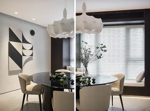 Circular dining room with marble table and contemporary chandelier, modern interior design