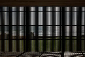 A modern interior space featuring metallic mesh, providing a contemporary and sleek aesthetic.