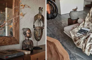 Modern living room with wooden furniture, marble flooring, and decorative sculptures.