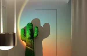A metallic green cactus decoration in a designed space
