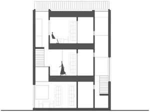 Floor plan of a minimalist residential building showing two stories and layout.