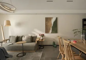 A modern living room featuring wood furniture and a minimalist design.