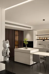 A modern minimalist kitchen with sleek, contemporary features.