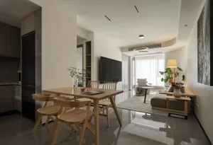 A modern residential interior featuring wooden furniture, a dining table, and living area with a cozy seating arrangement, la