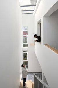 Modern indoor design featuring glass panels with glass lighting fixtures.