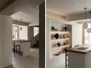 Modern minimalist residential kitchen with concrete surfaces and minimalist design elements.