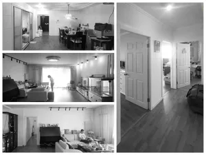 A modern home interior with white flooring, showcasing contemporary design elements.