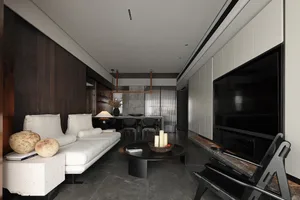 Modern living room featuring a mix of materials, including white couches, black chairs, and a white coffee table.