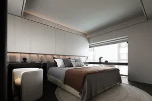 A sleek modern bedroom with minimalist furniture and concrete flooring.