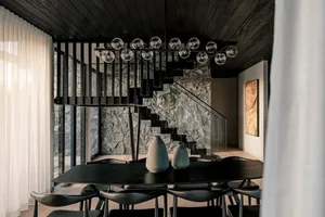 Modern interior space featuring a combination of wooden and stone materials.