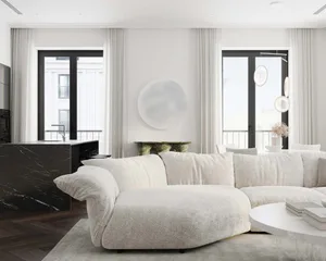 Modern minimalist living room with plush white sofa, marble kitchen island, and floor-to-ceiling windows