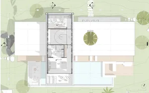 Floor plan of a modern residential building with various rooms and spaces.