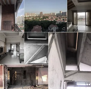 Modern interior space featuring exposed concrete beams, wooden floors, and brick walls.