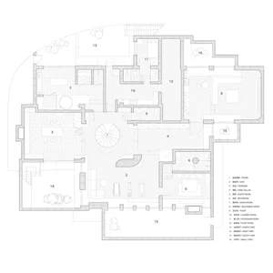 Floor plan of a modern residential house showing various rooms and wings.