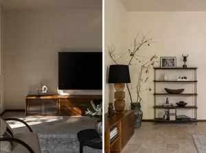 Modern minimalistic living room with wooden and glass furniture, black accents, and a clean aesthetic.
