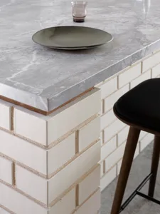 A sleek, modern kitchen counter featuring a marble surface.