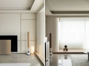 Modern minimalist living room with sleek wooden floor lamp and glass windows with sheer curtains.