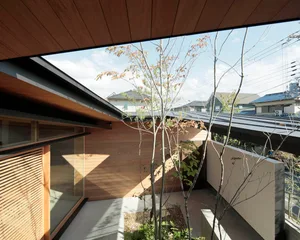 A modern architectural exterior featuring wooden walls.