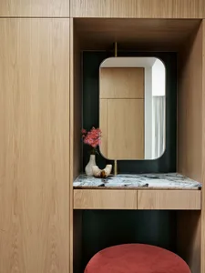 A modern interior space featuring wooden furniture.