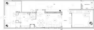 A minimalist residential office design showcasing a white and grey color palette with an open floor layout.