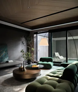 A modern living room with green upholstery, wooden ceiling, and glass wall.