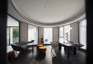 A modern, minimalist home office featuring sleek black furniture, large windows, and a visible cello.