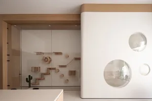 Modern interior design featuring a cat playzone with wood finishes.