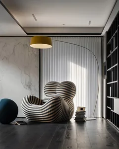 A modern living room featuring a unique, textured armchair and a sleek, floor-standing lamp.