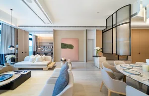 Modern residential interior featuring marble details such as countertops, flooring, and walls.