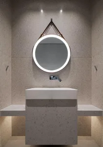 A minimalist bathroom featuring a terrazzo sink and wall-mounted fixtures.