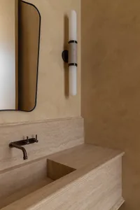 Geometric marble bathroom with minimalist design features isolated on beige background.