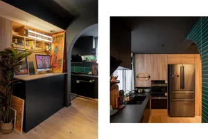 A modern kitchen with wooden cabinets, metal appliances, and glass countertops.