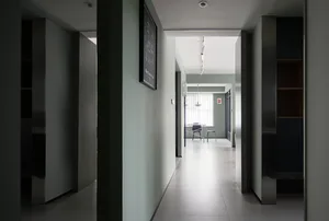 Interior shot of a modern office suite with concrete flooring and minimalist design.