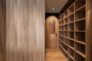 A modern interior with wooden storage shelves.