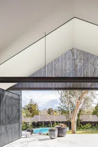 A modern exterior design featuring concrete materials and a minimalist architectural style.