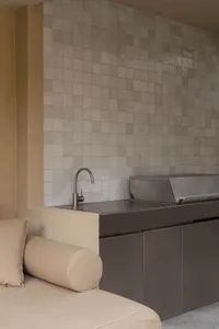 A modern kitchen featuring granite countertops and stainless steel appliances.