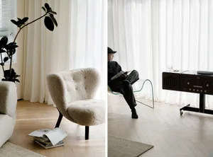 A cozy modern living room features comfortable seating and soft furnishings.