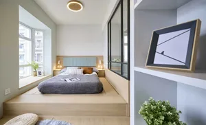 A modern bedroom with a wooden platform bed, minimalistic decor, and large windows