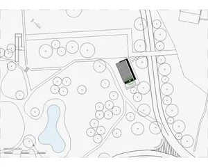 Landscape design blueprint with trees, paths, and green spaces.