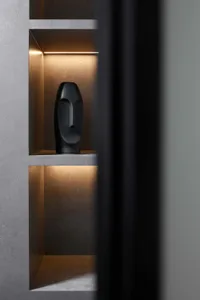 Modern Art Deco interior with metallic sculpture lighting.