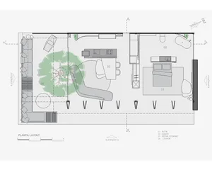 A detailed 2D architectural drawing of a modern apartment featuring furniture layout, kitchen, and bedroom areas.