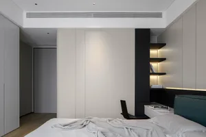 Modern minimalist bedroom with concrete walls, wooden floors, and glass elements